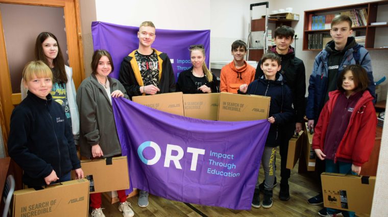 Students at the ORT School in Zaporizhzhia with gifts of laptops from generous donors.